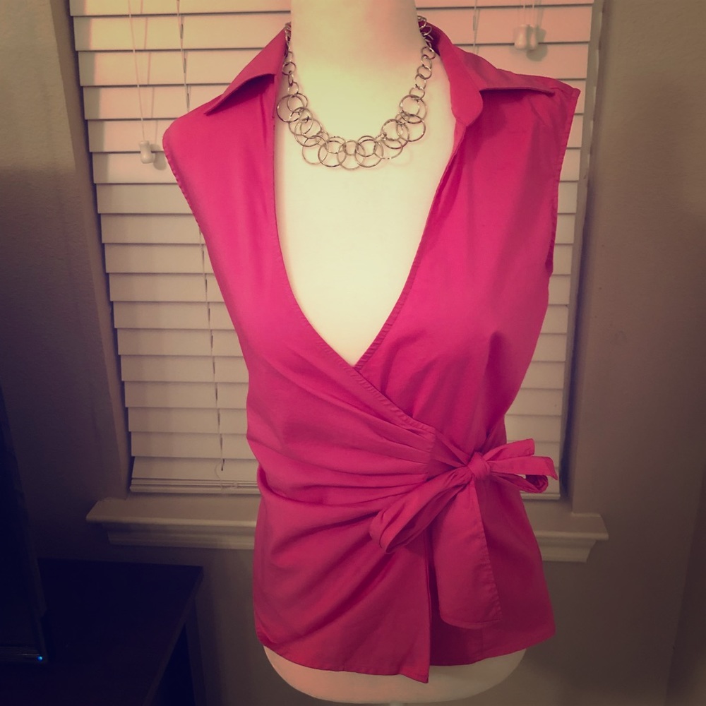 Pink sleeveless wrap blouse